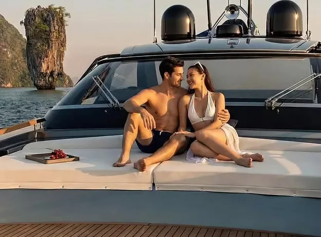 Couple relaxing on luxury yacht